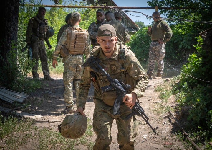 Ukrainian soldiers attend their positions, in the Donetsk region, Ukraine, Saturday, July 2, 2022. (AP Photo/Efrem Lukatsky)