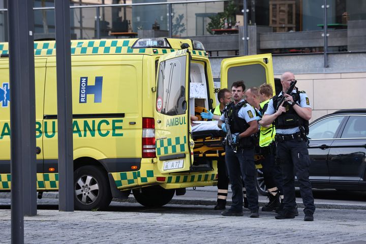An ambulance and armed police stand outside Field's shopping centre, after Danish police said they received reports of shooting, in Copenhagen, Denmark, July 3, 2022. Ritzau Scanpix/Olafur Steinar Gestsson via REUTERS ATTENTION EDITORS - THIS IMAGE WAS PROVIDED BY A THIRD PARTY. DENMARK OUT. NO COMMERCIAL OR EDITORIAL SALES IN DENMARK.