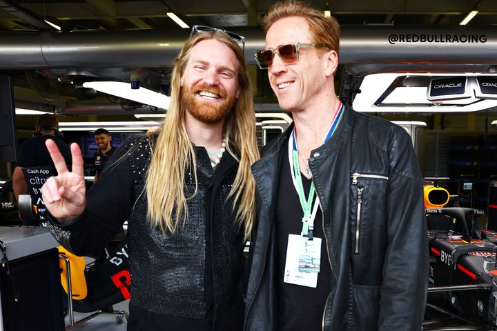 Sam Ryder and actor Damien Lewis pose for a photo outside the Red Bull Racing garage prior to the F1 Grand Prix of Great Britain at Silverstone July 3 in Northampton, England.