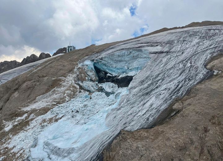 This undated image made available Monday, July 4, 2022, by the press office of the Autonomous Province of Trento shows the glacier in the Marmolada range of Italy's Alps near Trento from which a large chunk has broken loose Sunday, killing at least six hikers and injuring nine others.