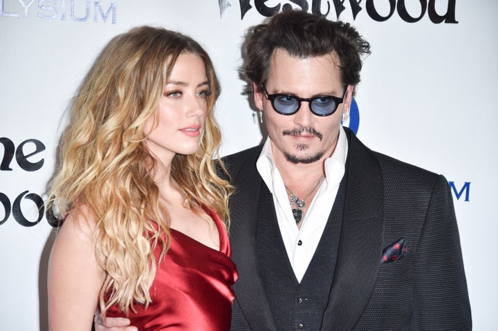 Amber Heard and Johnny Depp pictured in 2016 while they were still married