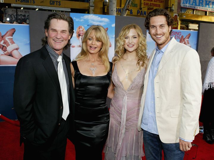 The Hudson siblings with their famous parents Goldie Hawn and Kurt Russell in 2004.