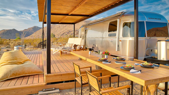 Spend some time in the great outdoors at this <a href="https://airbnb.pvxt.net/c/2706071/264339/4273?subId1=glampingairbnb-kristenadaway-070622-62c58d5be4b0aa392d38f71a&u=https%3A%2F%2Fwww.airbnb.com%2Frooms%2F44403770%3Fsource_impression_id%3Dp3_1657117571_TyiKRm9pF5gVlefQ" target="_blank" role="link" rel="sponsored" class=" js-entry-link cet-external-link" data-vars-item-name="Airstream Airbnb" data-vars-item-type="text" data-vars-unit-name="62c58d5be4b0aa392d38f71a" data-vars-unit-type="buzz_body" data-vars-target-content-id="https://airbnb.pvxt.net/c/2706071/264339/4273?subId1=glampingairbnb-kristenadaway-070622-62c58d5be4b0aa392d38f71a&u=https%3A%2F%2Fwww.airbnb.com%2Frooms%2F44403770%3Fsource_impression_id%3Dp3_1657117571_TyiKRm9pF5gVlefQ" data-vars-target-content-type="url" data-vars-type="web_external_link" data-vars-subunit-name="article_body" data-vars-subunit-type="component" data-vars-position-in-subunit="0">Airstream Airbnb</a> in Joshua Tree, California. Take in amazing desert views that are just perfect for glamping.