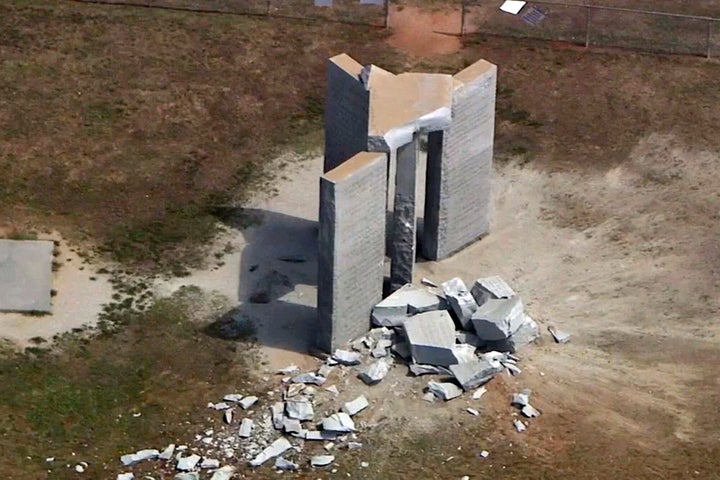 This aerial image taken from video, show damage to the Georgia Guidestones monument near Elberton, Ga., on Wednesday, July 6, 2022. The Georgia Bureau of Investigation said the monument, which some Christians regard as satanic, was damaged by an explosion before dawn. (WSB-TV via AP)