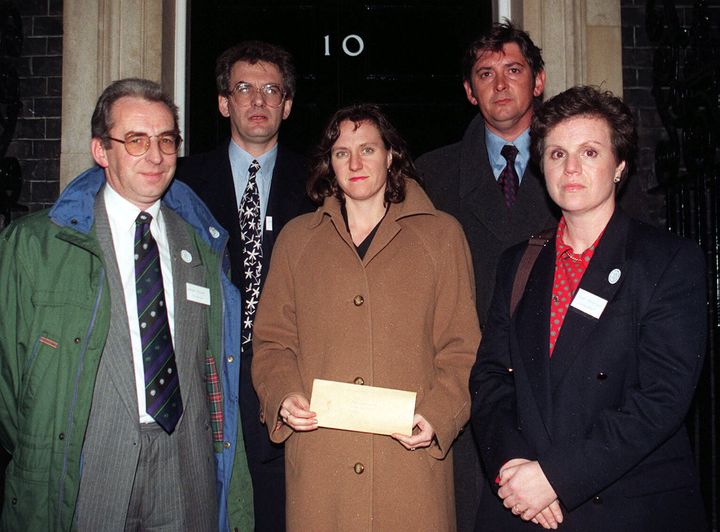 Rosemary Hunter, center, with other Snowdrop Campaign members outside 10 Downing Street with the petition calling for a total handgun ban in November 1996.