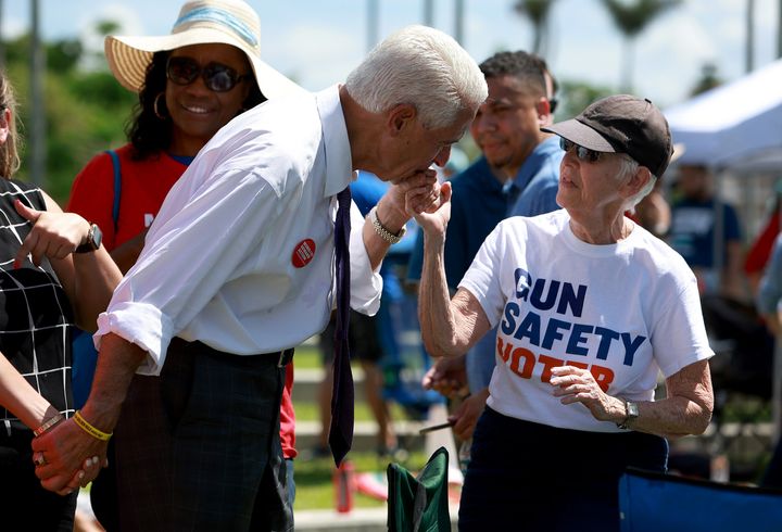 Rep. Charlie Crist (D-Fla.), a candidate for Governor of Florida, greets Betsy Golland during a vigil at the Sunrise Amphitheater on May 28, 2022, in Sunrise, Florida.