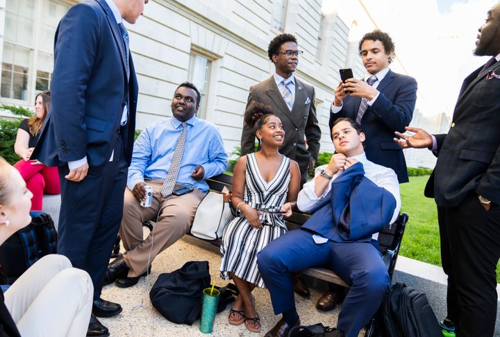 Congressional interns wait to attend a June 9 hearing of the House select committee investigating the Jan. 6, 2021, insurrection. A survey of incoming interns found almost half attend private colleges and almost a quarter come from families with annual incomes of $200,000 or more.