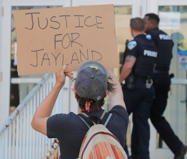 Protesters confronted Akron police officers in Akron, Ohio over the shooting death of Jayland Walker in June. 