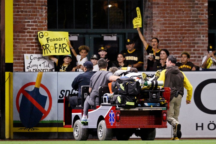 SAN DIEGO, CA - JULY 7: Jurickson Profar of the San Diego Padres is carted off the field during a baseball game at Petco Park on Thursday. Profar was injured after a collision with his teammate C.J. Abrams.