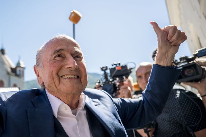Former FIFA president Sepp Blatter gives a thumbs up as he leaves Switzerland's Federal Criminal Court after the verdict of his trial over a suspected fraudulent payment, in the southern Switzerland city of Bellinzona, on July 8, 2022. 