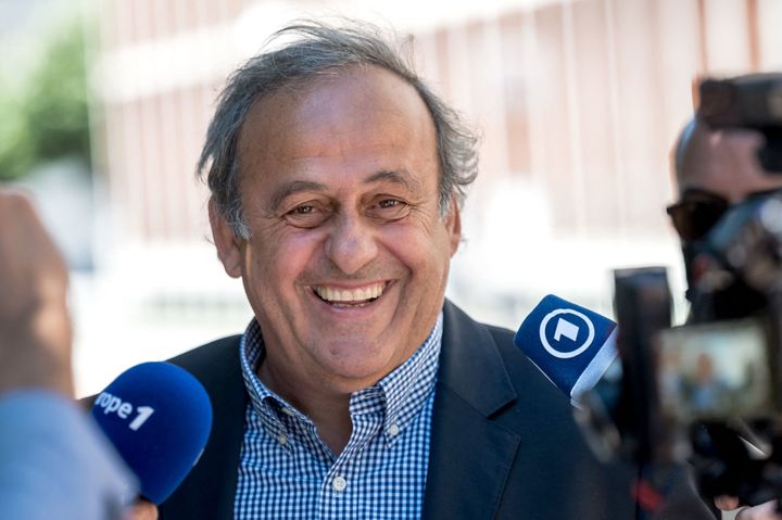 Former UEFA president Michel Platini reacts as he talks to journalists after the verdict of his trial over a suspected fraudulent payment, at Switzerland's Federal Criminal Court, in the southern Switzerland city of Bellinzona, on July 8, 2022. 