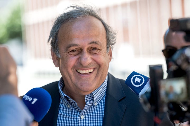 Former UEFA president Michel Platini reacts as he talks to journalists after the verdict of his trial over a suspected fraudulent payment, at Switzerland's Federal Criminal Court, in the southern Switzerland city of Bellinzona, on July 8, 2022.