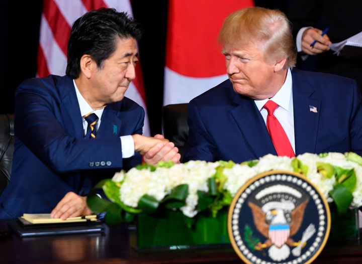 Abe and U.S. President Donald Trump shake hands during a meeting on trade in New York, Sept. 25, 2019, on the sidelines of the United Nations General Assembly.
