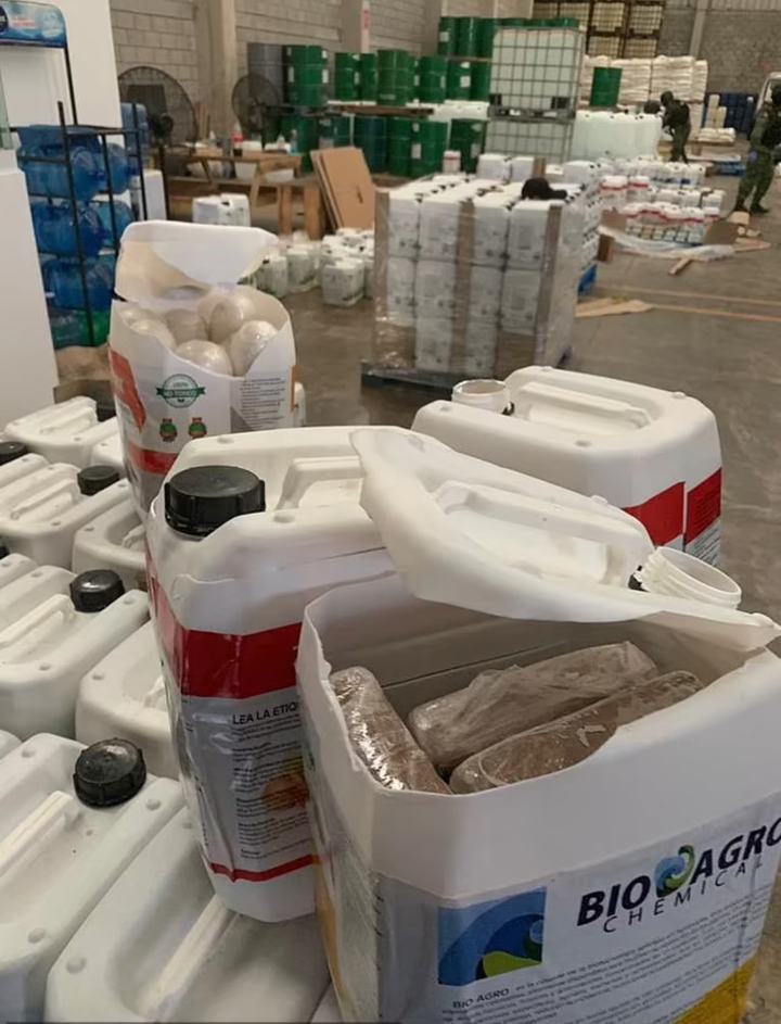 Cocaine, heroin, and processing materials were also seized.
