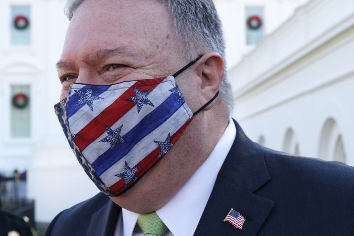 U.S. Secretary of State Mike Pompeo walks on the ground of the White House December 11, 2020 in Washington, DC.