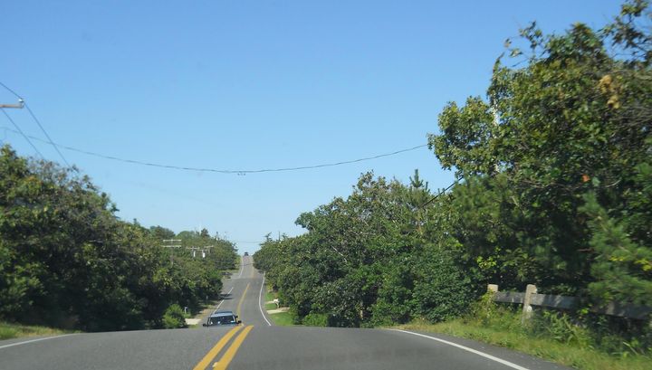 Old Montauk Highway, where the author writes that her father accelerated the car "as if we were at the beach, riding the waves."