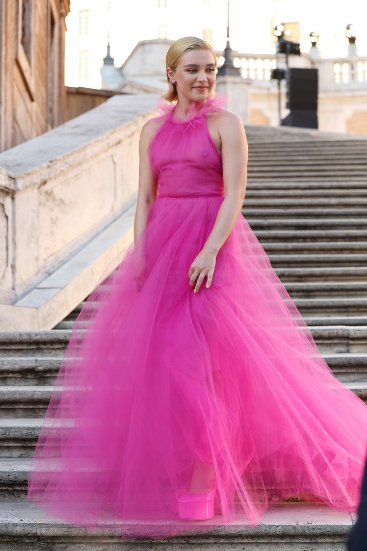 Florence strikes a pose for photographers at the Valentino show