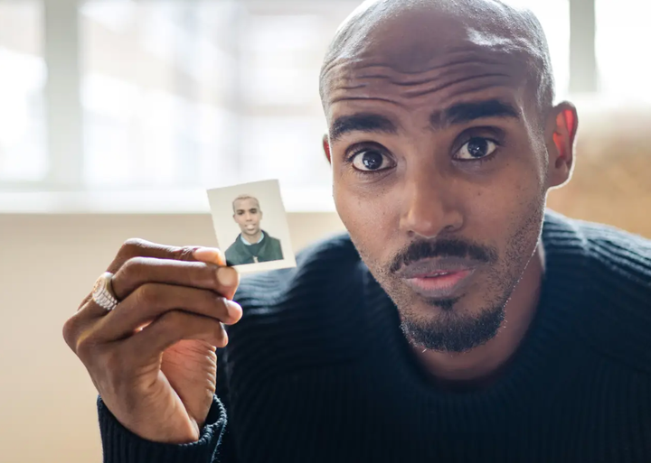 Sir Mo Farrah with his original passport photo.