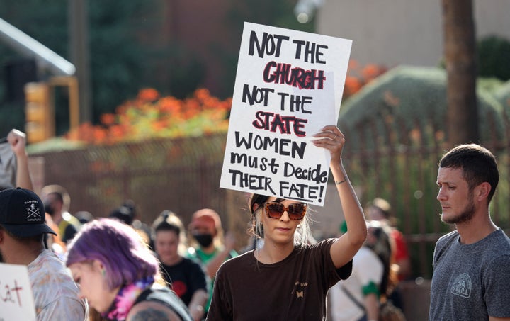 Abortion rights protesters attend a rally at the Tucson Federal Courthouse in Tucson, Arizona on July 4, 2022. 