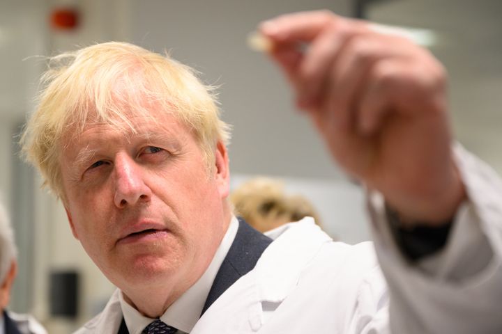 Prime Minister Boris Johnson looks at samples in a laboratory during a visit to the national flagship for biomedical research, the Francis Crick Institute, in central London, to highlight a newly announced £1 billion of funding for the Institute from the Medical Research Council (MRC), Cancer Research UK (CRUK) and the Wellcome Trust. Picture date: Monday July 11, 2022.