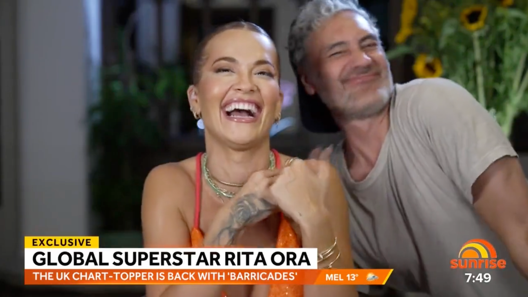 Taika Waititi Giddily Crashes Girlfriend Rita Ora’s Live Interview Taika Waititi Giddily Crashes Girlfriend Rita Ora’s Live Interview