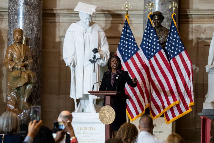 Rep. Val Demings (D-Fla.) speaks during a statue unveiling ceremony for civil rights pioneer Mary McLeod Bethune, center, in the U.S. Capitols Statuary Hall on Wednesday.
