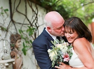 The author and Michael Savage celebrating on their wedding day, July 7, 2018.