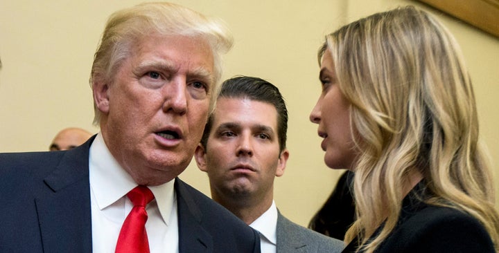 Donald Trump, left, his son Donald Trump Jr., center, and his daughter Ivanka Trump speak during the unveiling of the design for the Trump International Hotel in the The Old Post Office, in Washington, on Sept. 10, 2013. 