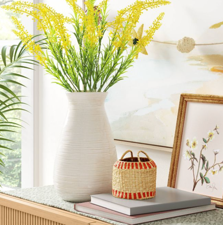A <a href="https://goto.target.com/c/2706071/81938/2092?subId1=homedecor-griffinwynne-07142022-62d0517ce4b09423278593b3&u=https%3A%2F%2Fwww.target.com%2Fp%2Fshorter-handled-basket-opalhouse-8482-designed-with-jungalow-8482%2F-%2FA-83694565%23lnk%3Dsametab" target="_blank" role="link" rel="sponsored" class=" js-entry-link cet-external-link" data-vars-item-name="little tabletop basket from Target" data-vars-item-type="text" data-vars-unit-name="62d0517ce4b09423278593b3" data-vars-unit-type="buzz_body" data-vars-target-content-id="https://goto.target.com/c/2706071/81938/2092?subId1=homedecor-griffinwynne-07142022-62d0517ce4b09423278593b3&u=https%3A%2F%2Fwww.target.com%2Fp%2Fshorter-handled-basket-opalhouse-8482-designed-with-jungalow-8482%2F-%2FA-83694565%23lnk%3Dsametab" data-vars-target-content-type="url" data-vars-type="web_external_link" data-vars-subunit-name="article_body" data-vars-subunit-type="component" data-vars-position-in-subunit="0">little tabletop basket from Target</a> making a big visual impact.