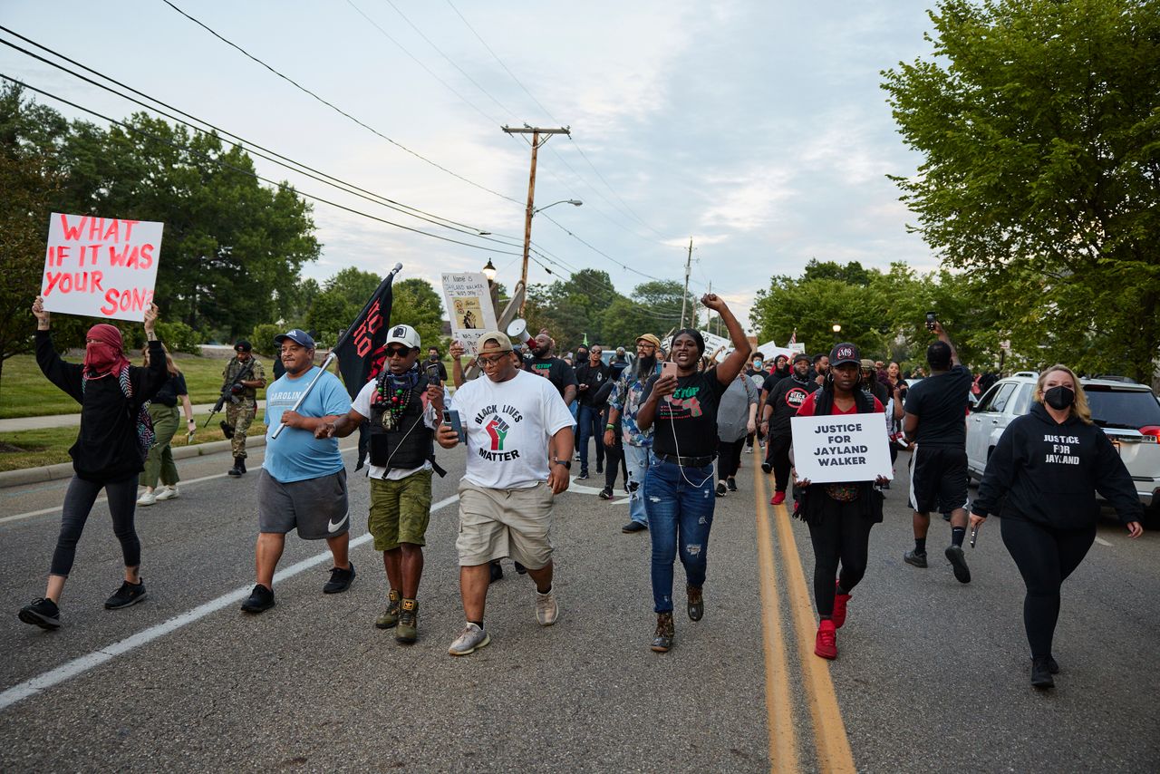 Protesters march after holding a vigil for Jayland Walker on July 8 in Akron, Ohio.