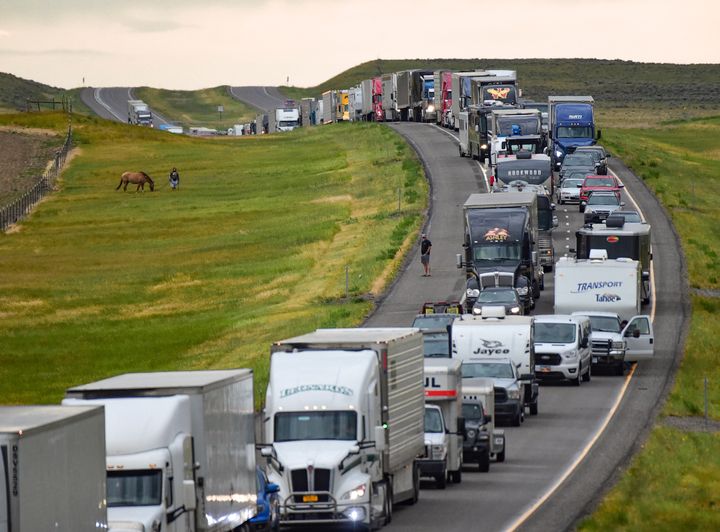 Traffic is backed up on Interstate 90 after a fatal pileup where at least 20 vehicles crashed near Hardin, Montana.