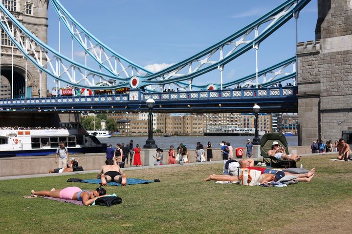 People enjoying the hot weather in the London Bridge area.
