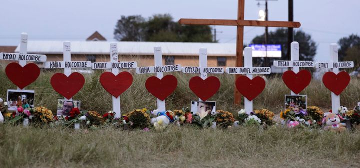 Crosses for members of the Holcombe family are part of a makeshift memorial for those who were killed in the 2017 Sutherland Springs Baptist Church shooting in Sutherland Springs, Texas.