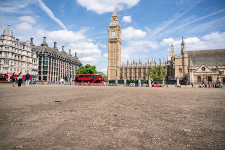 The dried-up ground in Parliament Square as the recent spell of hot weather continues.
