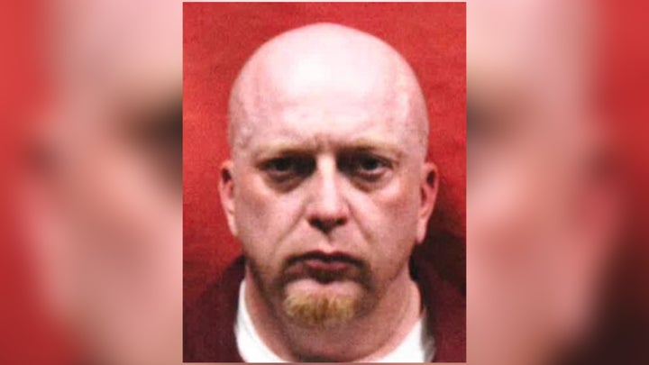 Ryan Dark White, also known as Jon McGreevey.