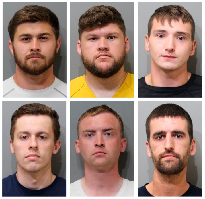 This combo of booking image provided by the Kootenai County Sheriff's Office shows, top row from left, Josiah Buster, his brother Mishael Buster, and Connor Moran, all of Watauga, Texas; bottom row, from left, Derek Smith of Sioux Falls, S.D; Dakota Tabler of West Valley City, Utah; and Justin O'Leary, of Des Moines, Wash. (Kootenai County Sheriff's Office via AP, File)