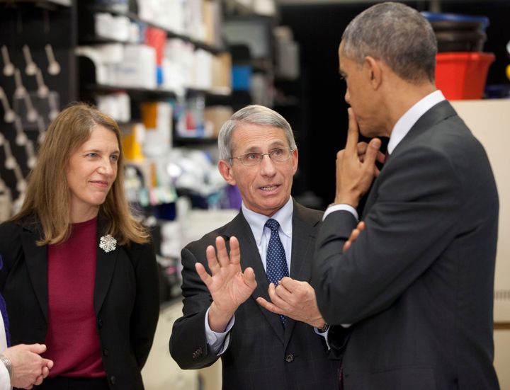 Fauci is seen with President Barack Obama and Health and Human Services Secretary Sylvia Mathews Burwell during a 2014 tour of the Vaccine Research Center at the National Institutes of Health in Maryland. Fauci has advised seven U.S. presidents.