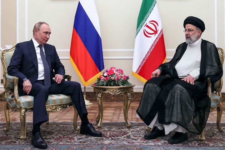 Russian President Vladimir Putin, left, and Iranian President Ebrahim Raisi pose for a photo prior to their talks at the Saadabad palace, in Tehran, Iran on July 19, 2022. 