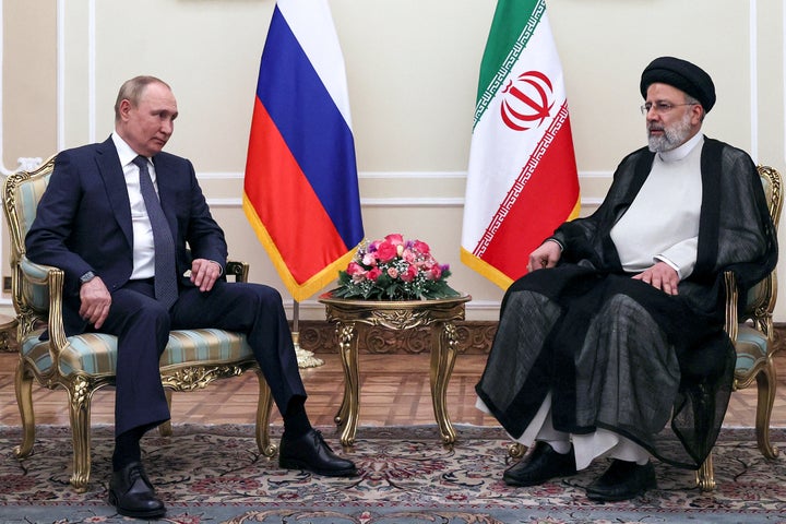 Russian President Vladimir Putin, left, and Iranian President Ebrahim Raisi pose for a photo prior to their talks at the Saadabad palace, in Tehran, Iran on July 19, 2022.