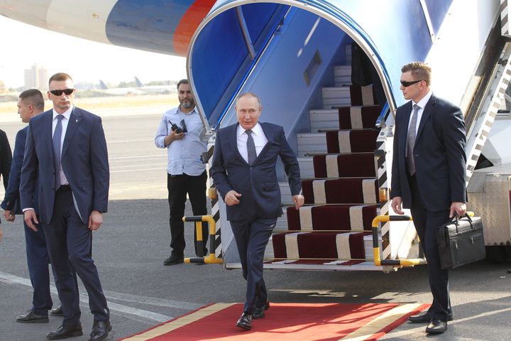 Russian President Vladimir Putin leaves his presidential plane during the welcoming ceremony at the airport on July 19, 2022 in Tehran, Iran.