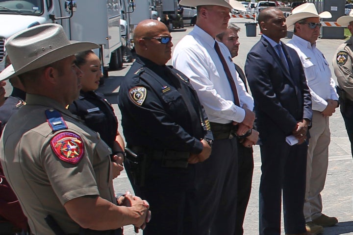 Uvalde School Police Chief Pete Arredondo (third from left) is seen in May. He was placed on administrative leave in June amid criticism over the law enforcement response.