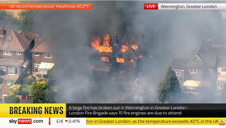 Video grab taken from Sky News of a blaze in the village of Wennington, east London.