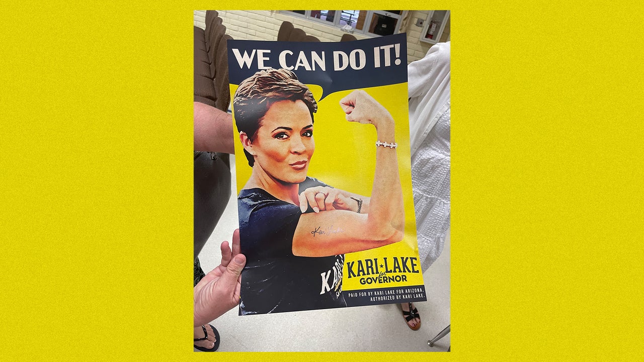 A campaign sign featuring Kari Lake as World War II icon Rosie the Riveter.