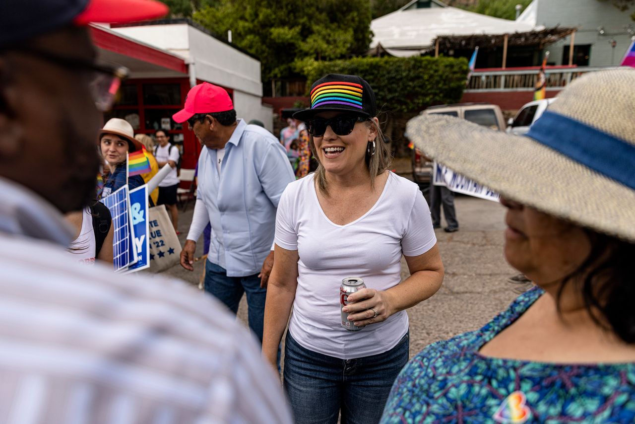 Arizona Secretary of State Katie Hobbs, a Democrat running for Arizona governor, talks to supporters at the Bisbee Pride Parade.