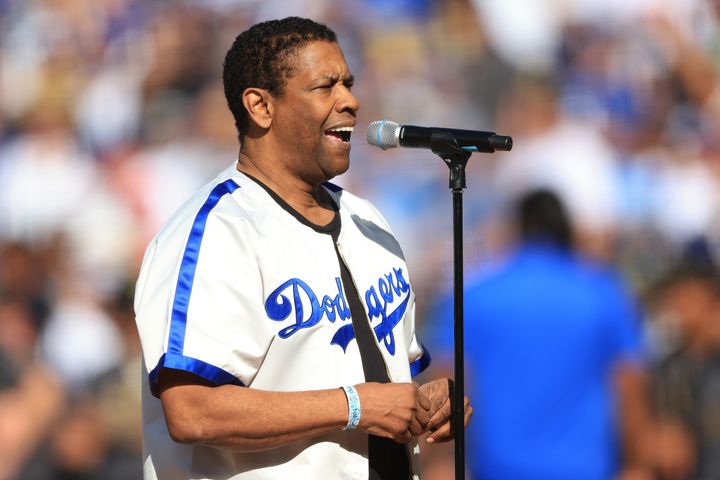 Denzel Washington leads a tribute to Jackie Robinson before the MLB All-Star Game on Tuesday at Dodgers Stadium in Los Angeles.