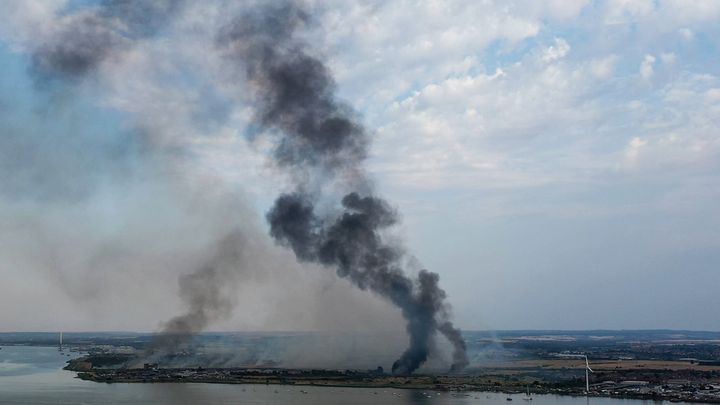 July 19 – smoke columns rise from Dartford, Kent, where a fire erupted earlier in the day