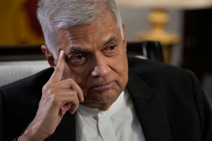 Sri Lanka's new Prime Minister Ranil Wickremesinghe gestures during an interview with The Associated Press in Colombo, Sri Lanka on June 11, 2022. Sri Lanka’s prime minister and acting president, Wickremesinghe, will face two rivals in a parliamentary vote Wednesday, July 20, on who will succeed the ousted leader who fled the country last week amid huge protests triggered by its economic collapse.