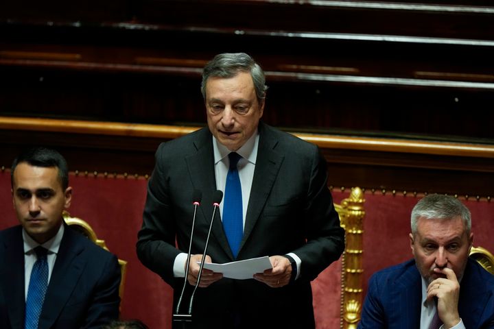 Italian Prime Minister Mario Draghi, center, flanked by Foreign Minister Luigi Di Maio, left, and Defense Minister Lorenzo Guerini, delivers his speech at the Senate in Rome on July 20, 2022. 