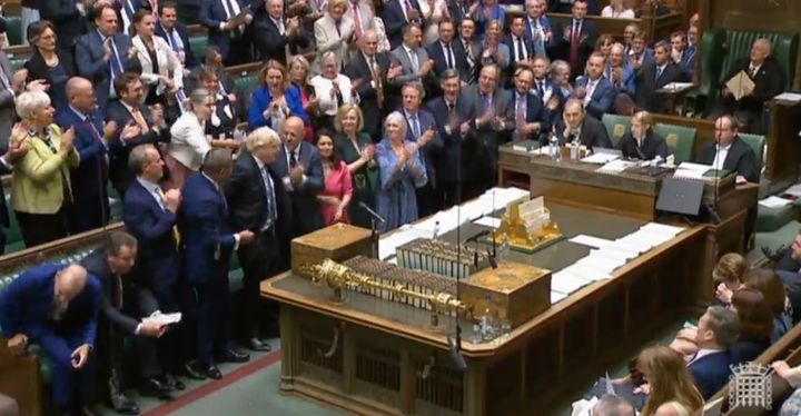 Tory MPs give Boris Johnson a standing ovation.