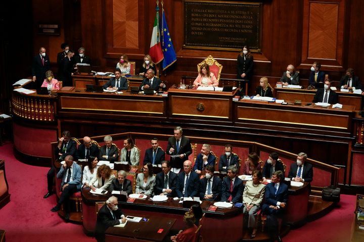 Italian Premier Mario Draghi, bottom center, flanked by Government's Ministers, delivers his speech at the Senate in Rome on July 20, 2022. 